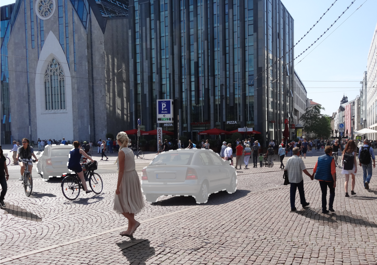 Augustusplatz Leipzig autofrei mit vielen Spaziergängern und dem Paulinum im Hintergrund